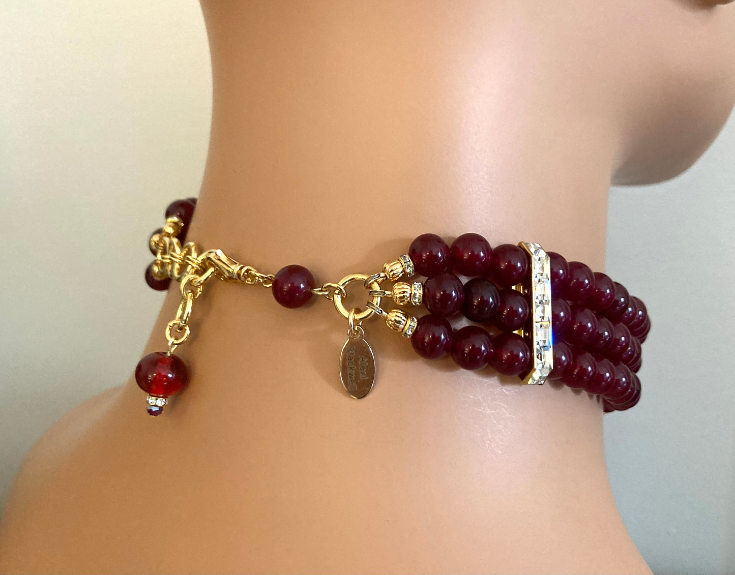 Red Choker Necklace with Gold Rhinestone bar accents adjustable made of cranberry red glass beads from Japan Cherry Brand vintage