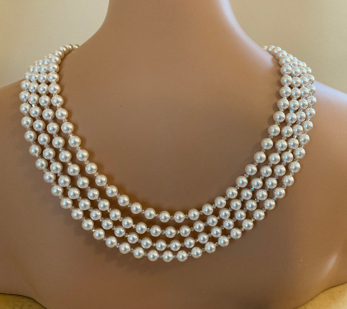 Audrey Necklace in Swarovski Pearls that drape down the back 4 multi strands with Brooch like Holly in the movie