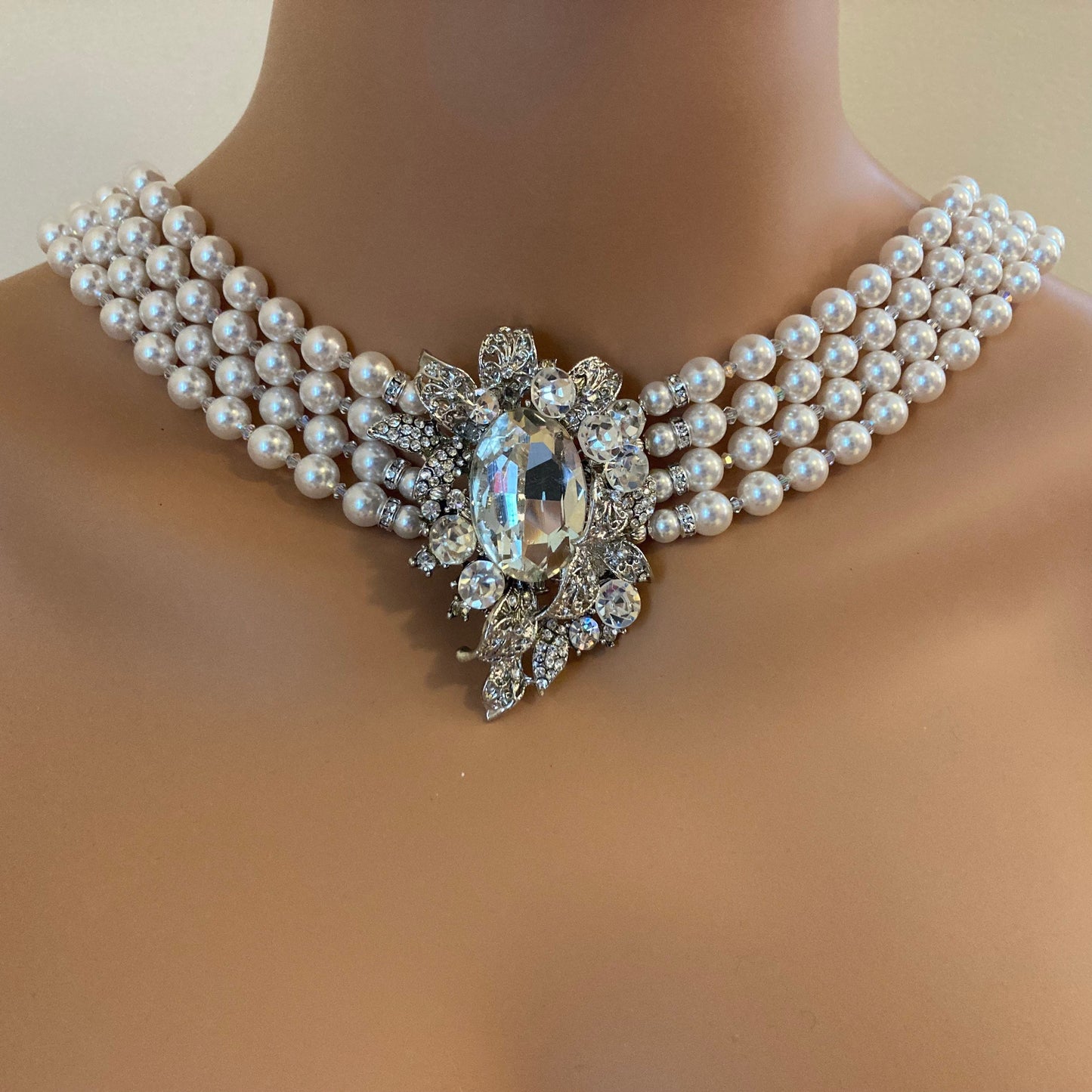 Audrey Necklace in Swarovski Pearls that drape down the back 4 multi strands with Brooch like Holly in the movie